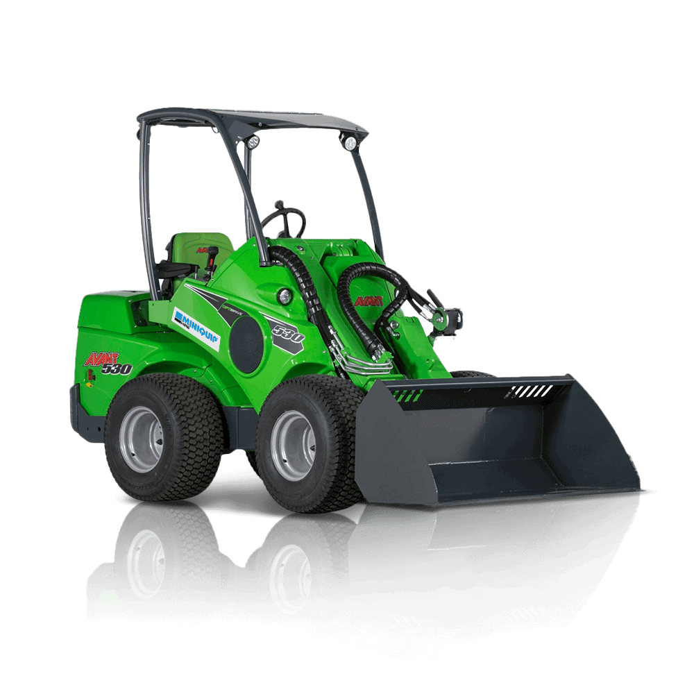Compact mini loader with bucket for construction and landscaping projects.